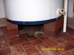 Drain under the water heater.