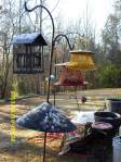 Snow on bird feeders.