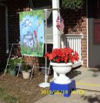 Red, white & blue planter at front porch.