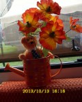Ty bear, watering pot, artificiial flowers