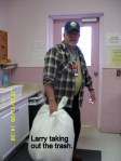 Larry taking out the trash