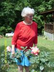 Dottie with her rose bushes