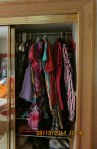 Hanging clothes in closet