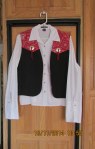 White shirt and western vest