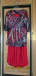 Red skirt; multi-color top