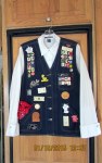 Denim vest with badges (front)