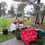 A blanket over several planters
