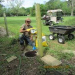 Elbert planting a Dogwood tree