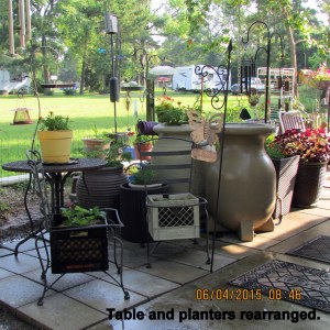 Table and planters rearranged