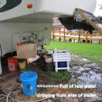 Pail is full of rain water