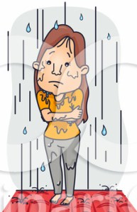 Lady standing in the rain