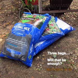 Three bags of potting soil