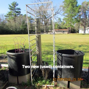 Two large black containers