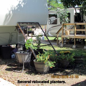 Bed frame and relocated planters