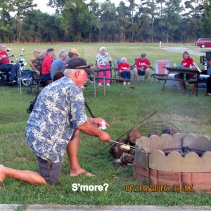 Woody making s'mores