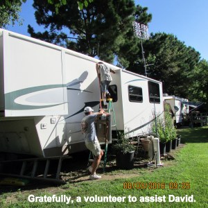 A CARE volunteer is helping