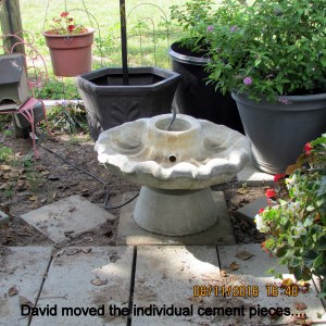 David moved the heavy pieces of fountain