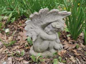 Sleeping angel garden statue