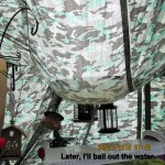 Gallons of water standing on tarp in May 2016