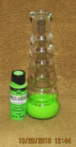 Clear glass vase and paint container