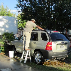 James cleaning the KIA (1)