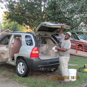 James cleaning the KIA (4)