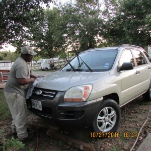 James cleaning the KIA (5)