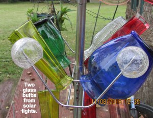 Two glass bulbs from solar lights
