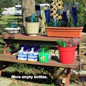 Eighteen empty beer bottles