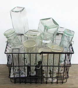 Square bottles in square basket