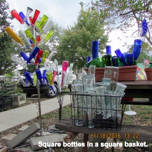 Square bottles in square basket