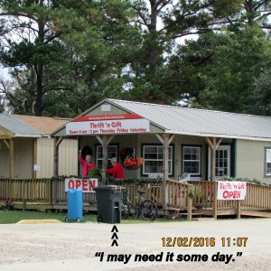 Trash receptacle in front of Thrift 'n Gift