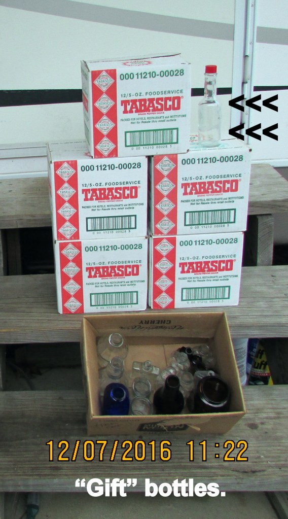 Six boxes of empty bottles