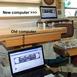 Two computers and clear table-top